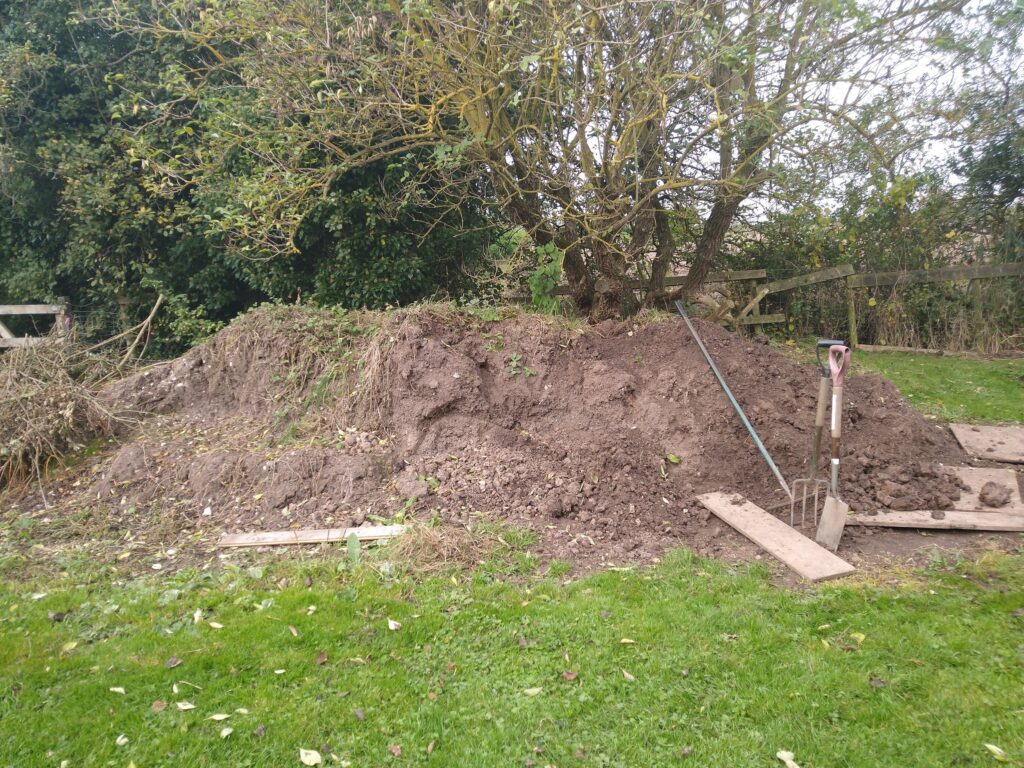 Demolishing soil mountain